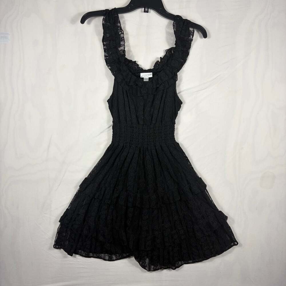 Black romper with textured black polka dots!
